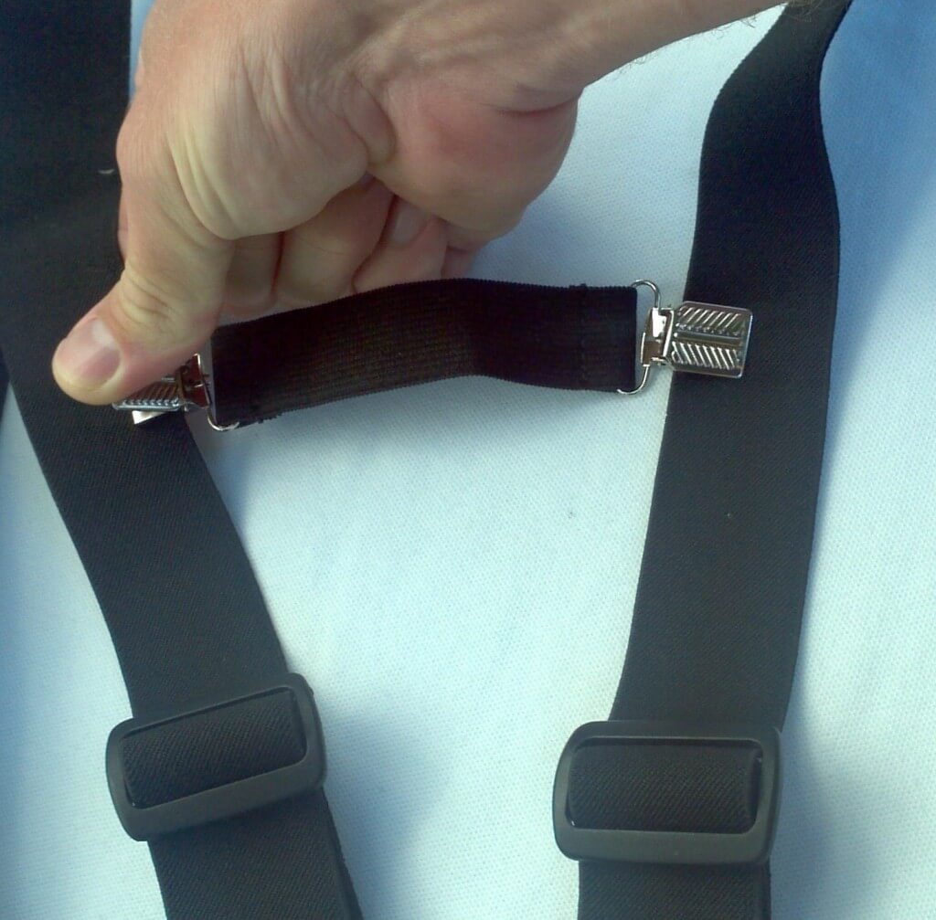 Fasten strap between shoulder straps
